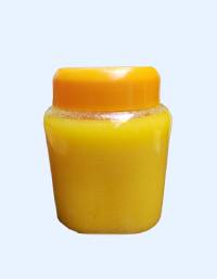 Yellow plastic jar with a matching screw-cap closure used for food, dairy, and consumer product packaging.